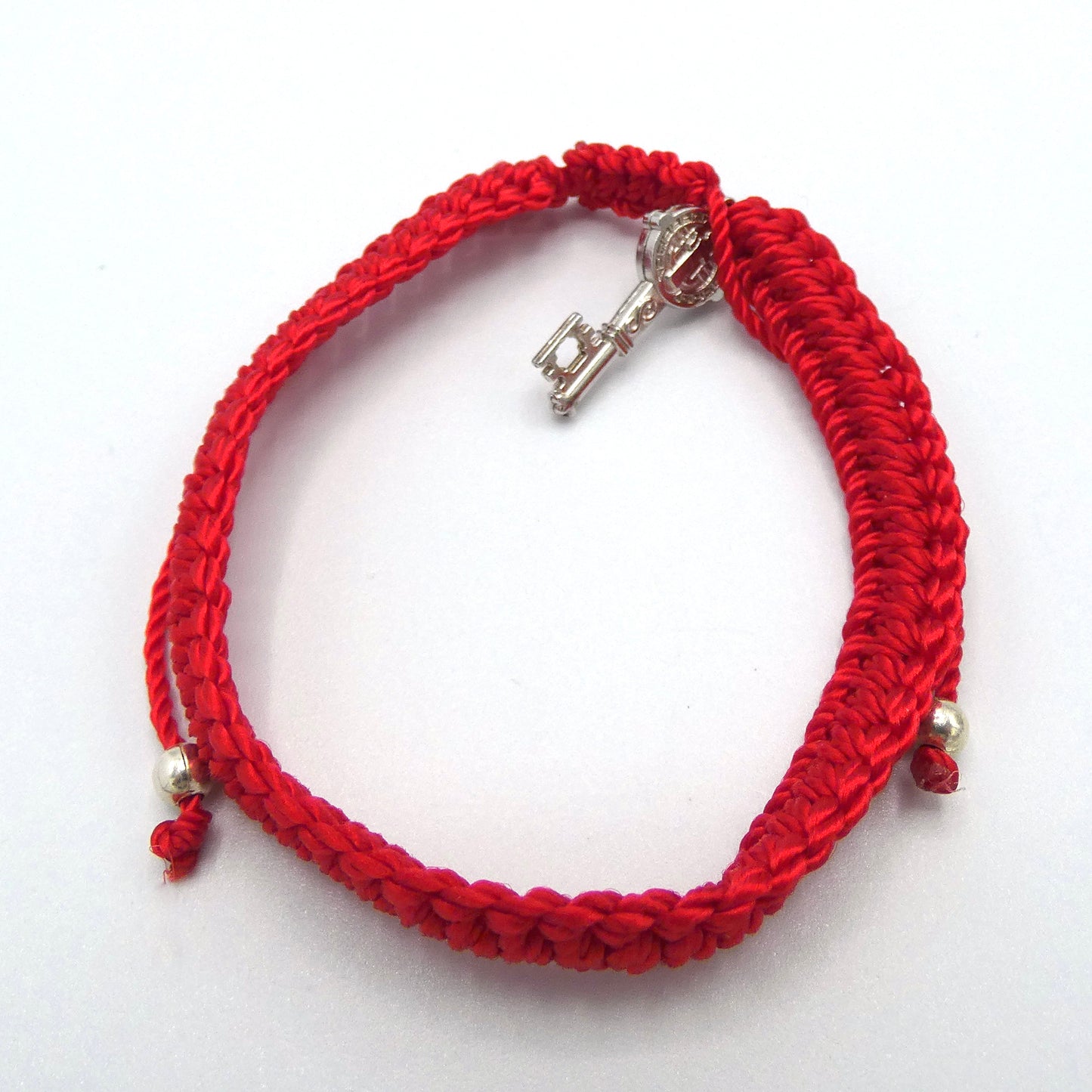Braided Bracelet of Assorted Colors and Medals