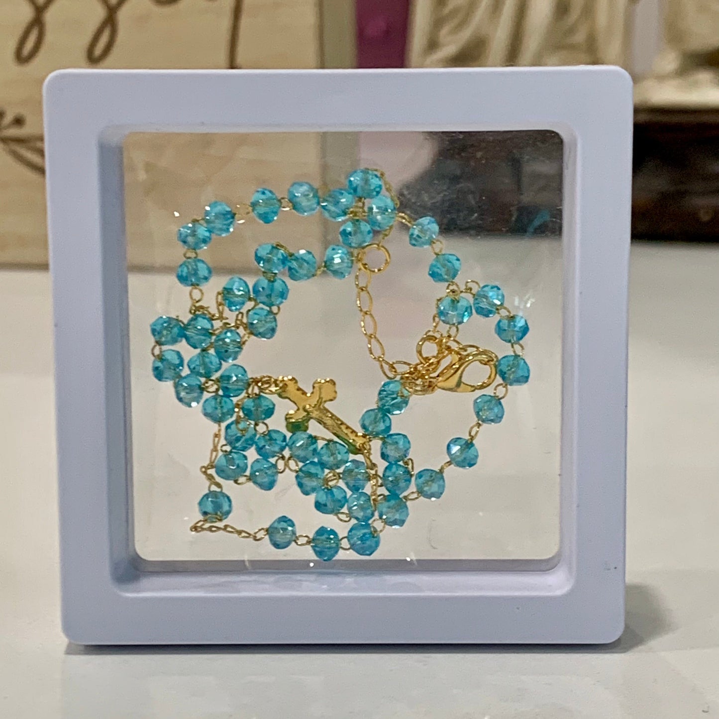 Short Gold and Blue Crystal Fatima Rosary Necklace in Framed Display Case