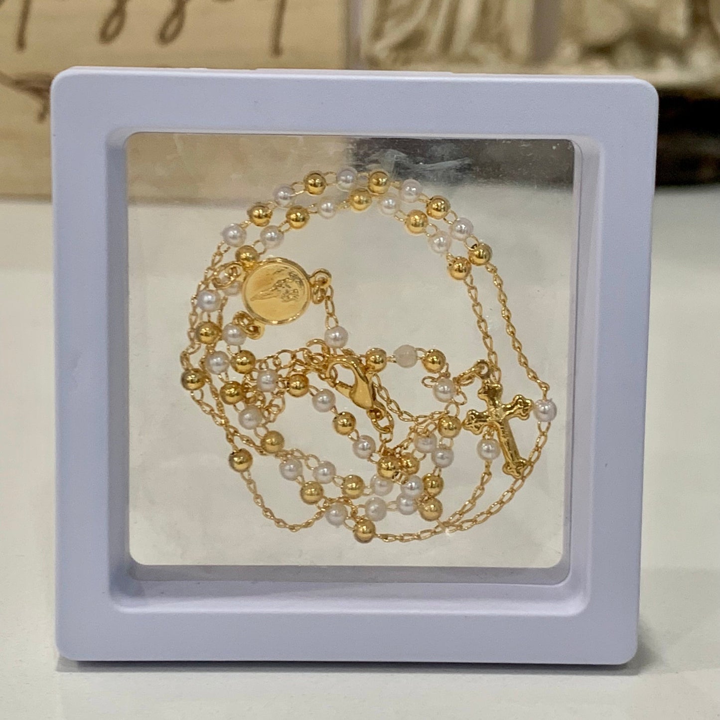 Gold and Pearl Rosary Necklace with Crystal Accent in Framed Display Case