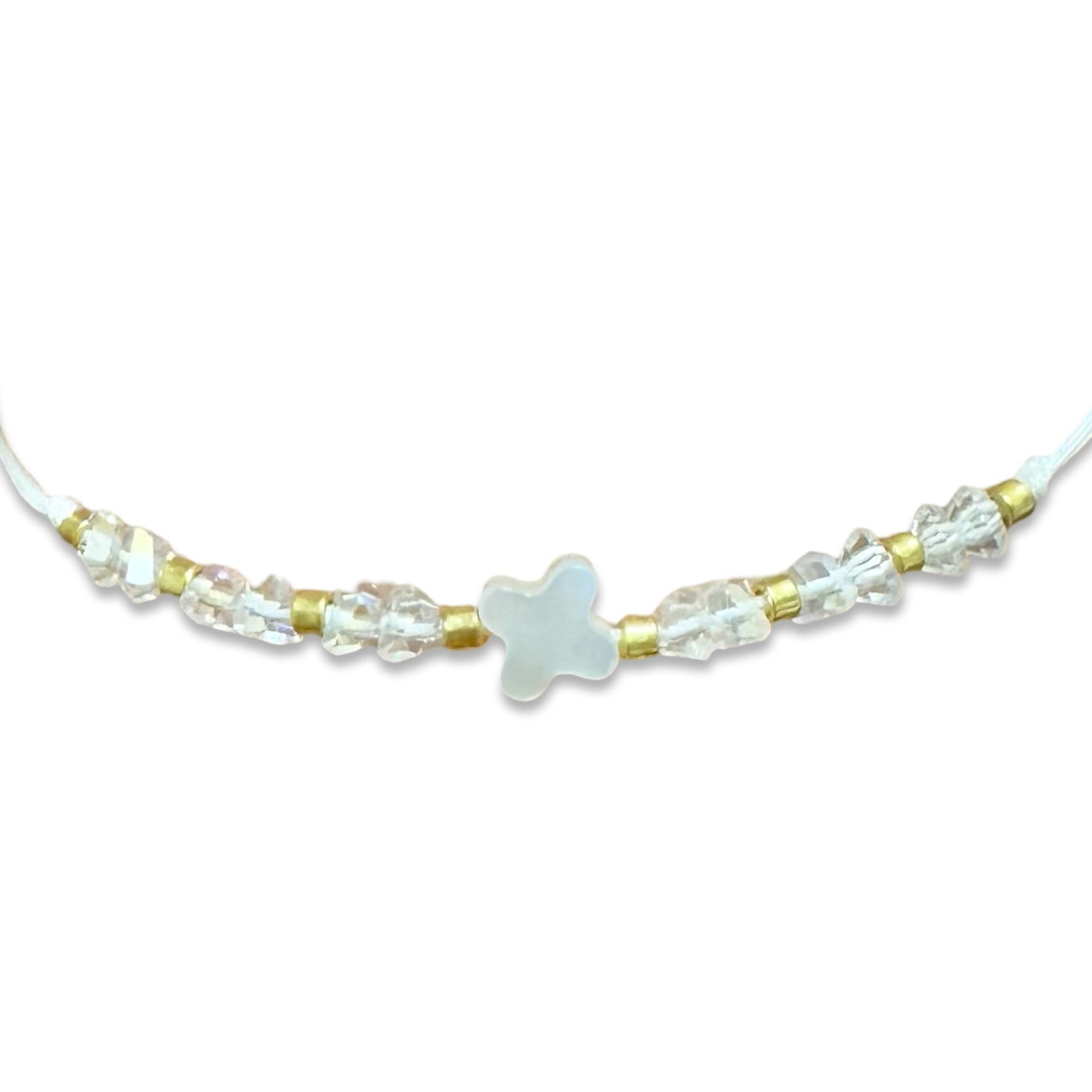 String Bracelet of Assorted Colors with Mother of Pearl Cross