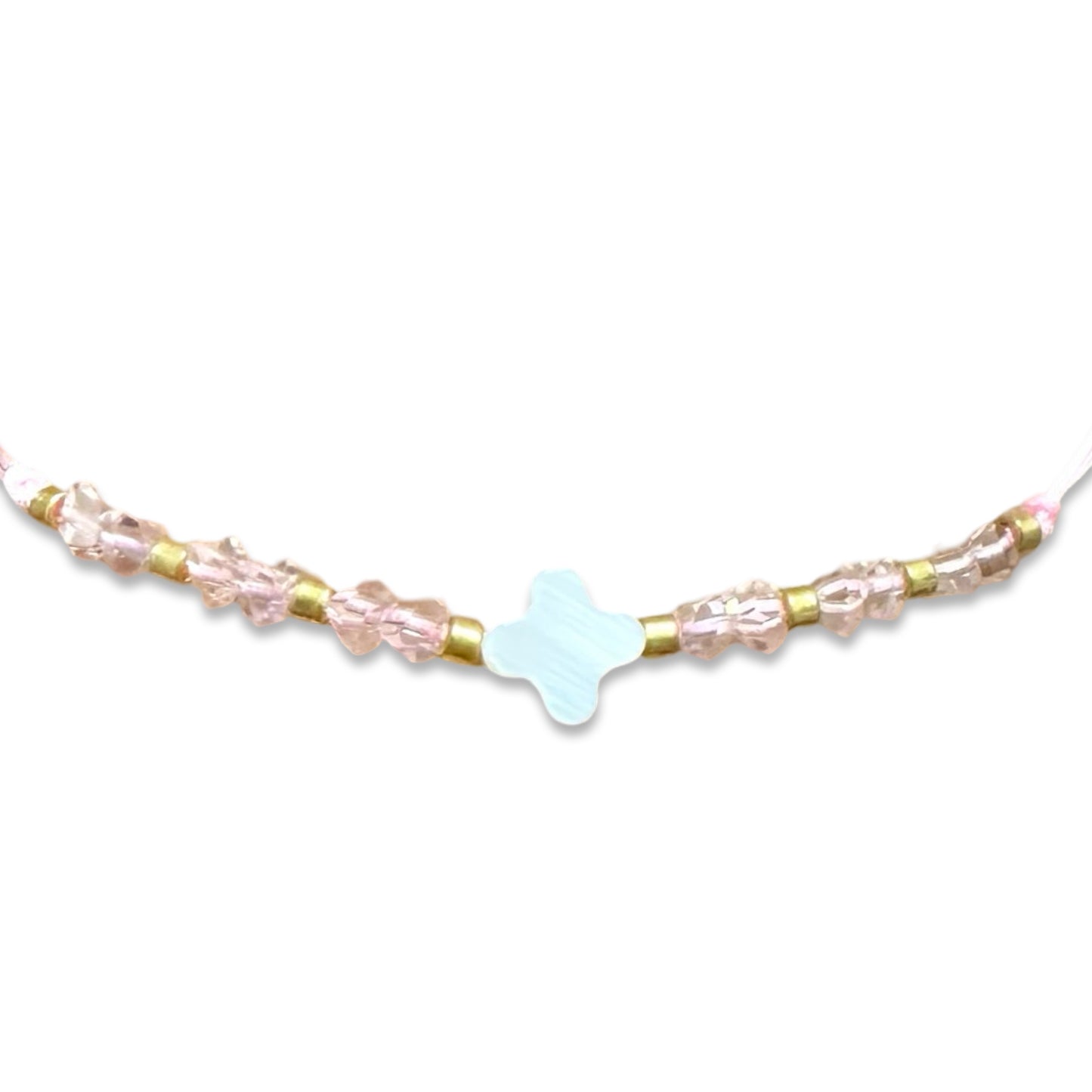 String Bracelet of Assorted Colors with Mother of Pearl Cross