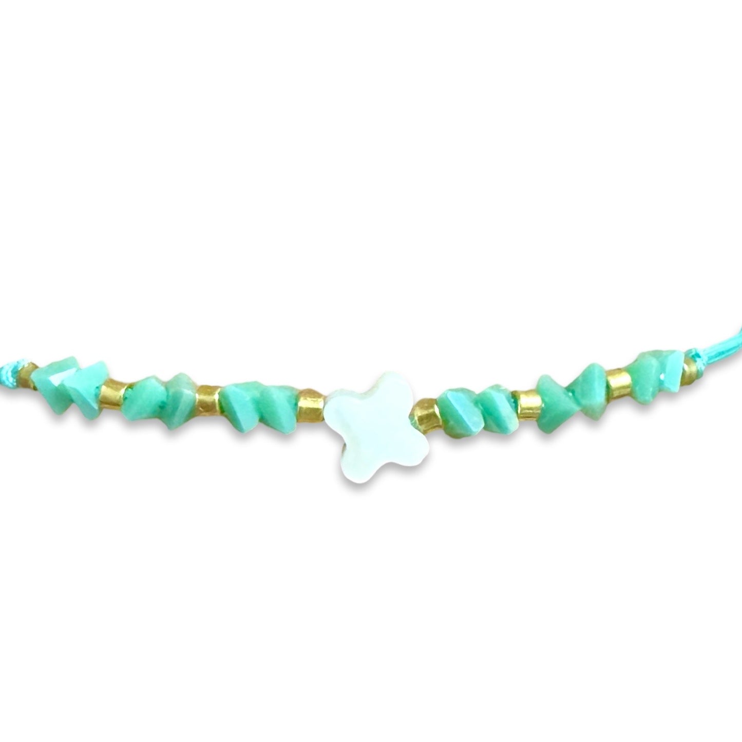 String Bracelet of Assorted Colors with Mother of Pearl Cross