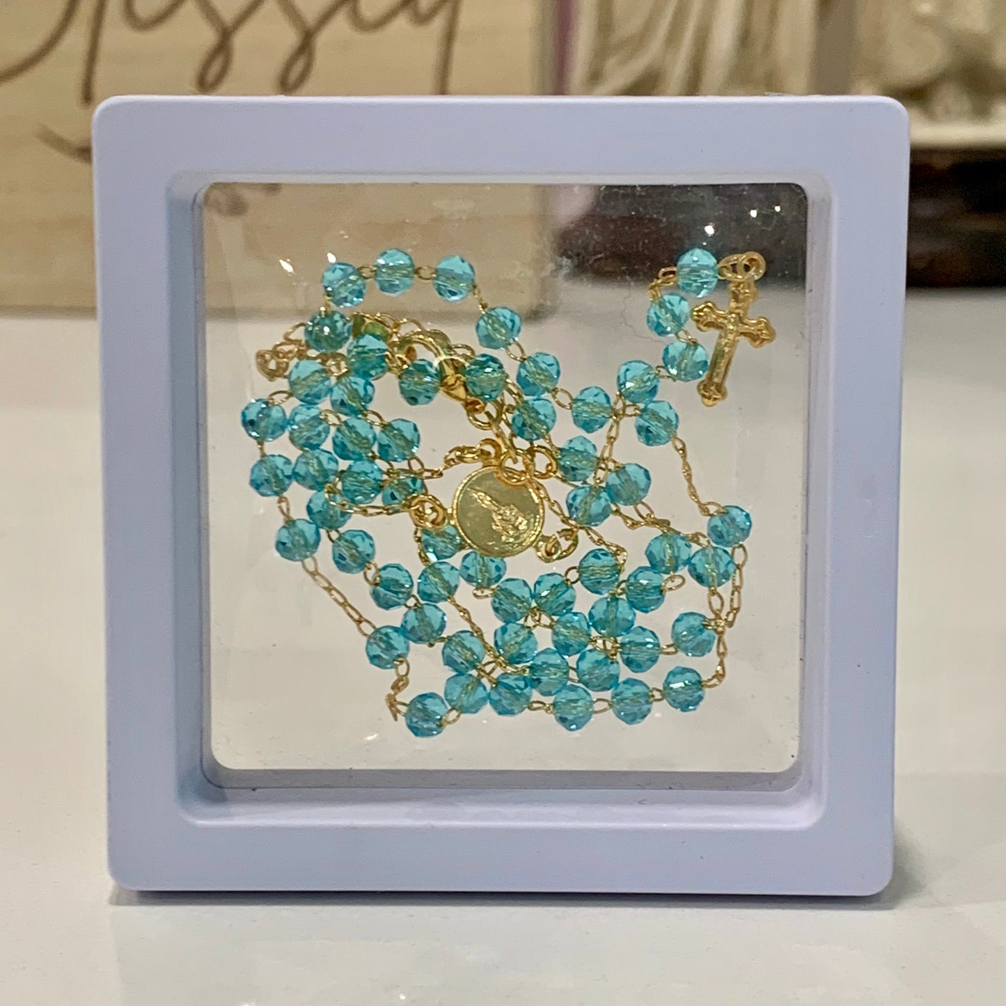 Delicate Gold and Crystal Rosary Necklace of Assorted Colors in Framed Display Case