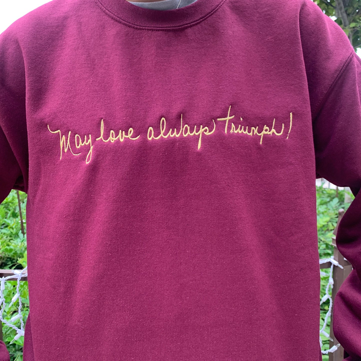 "May love always Triumph" Embroidered Crewneck Sweater by SCTJM