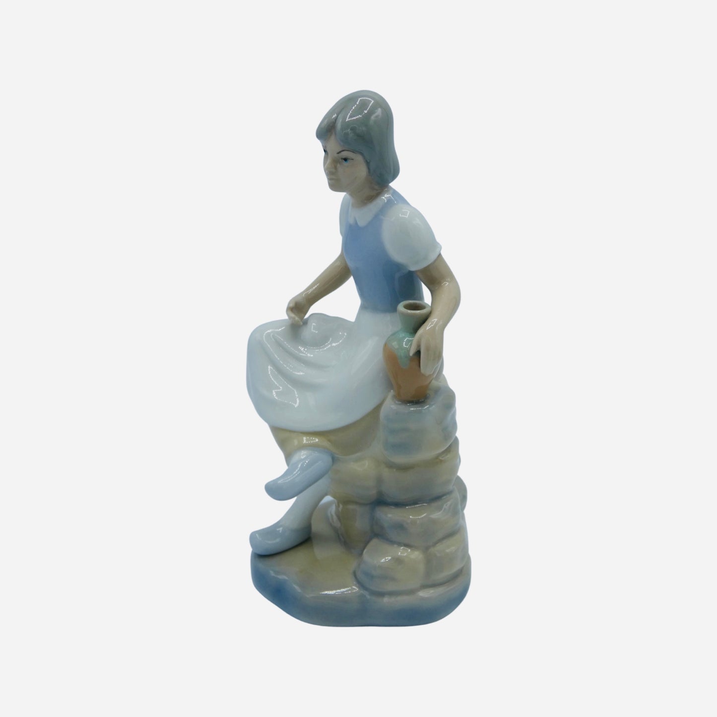 Porceval Woman Sitting with Jug